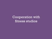 Text Cooperation with fitness studios on purple background